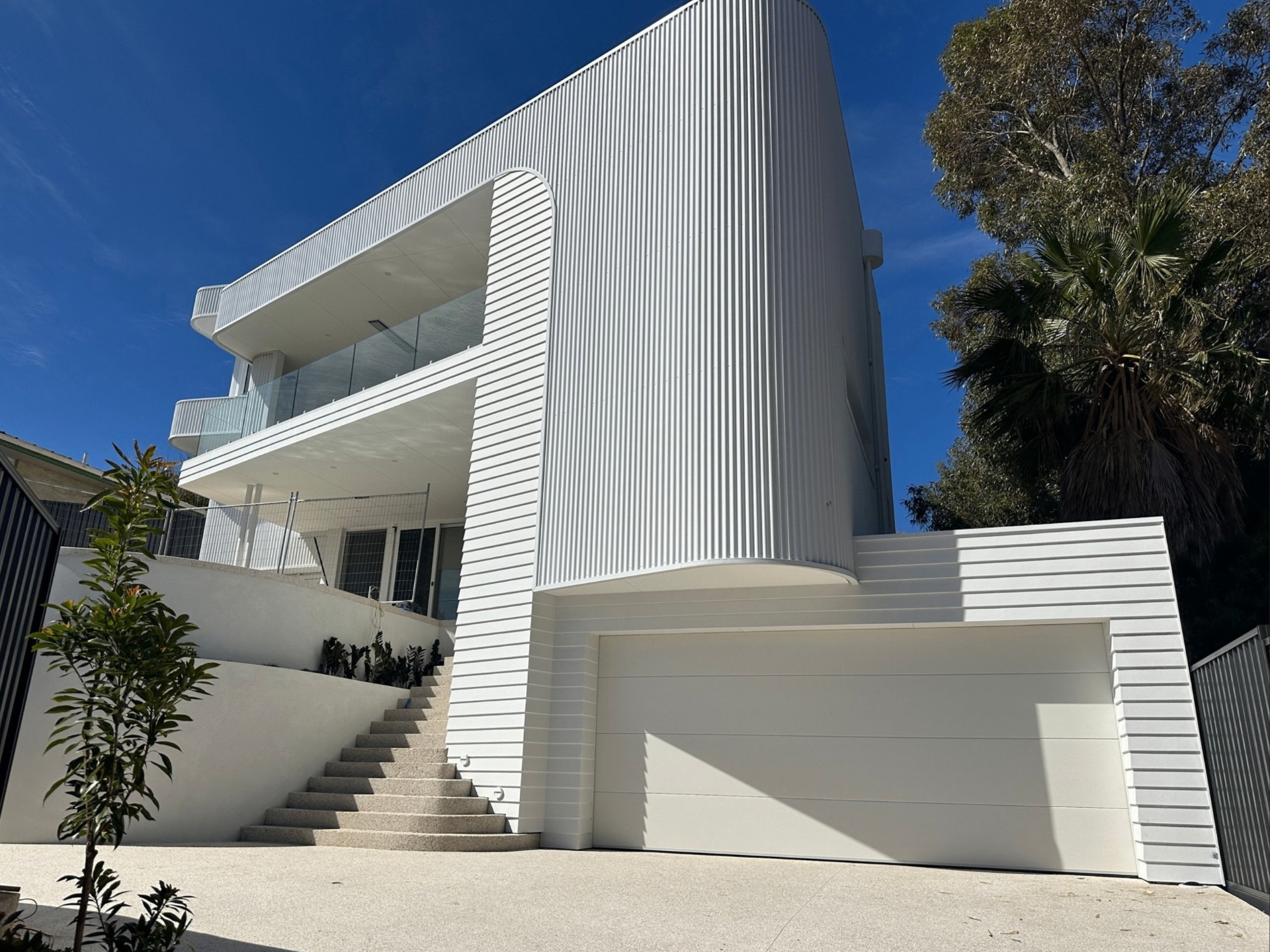 White modern garage door on Perth home